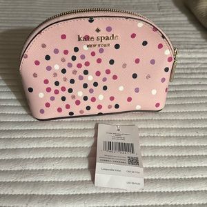 Kate spade leather traveler makeup bag.